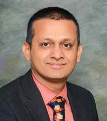 Dr. Dhrumil Shah